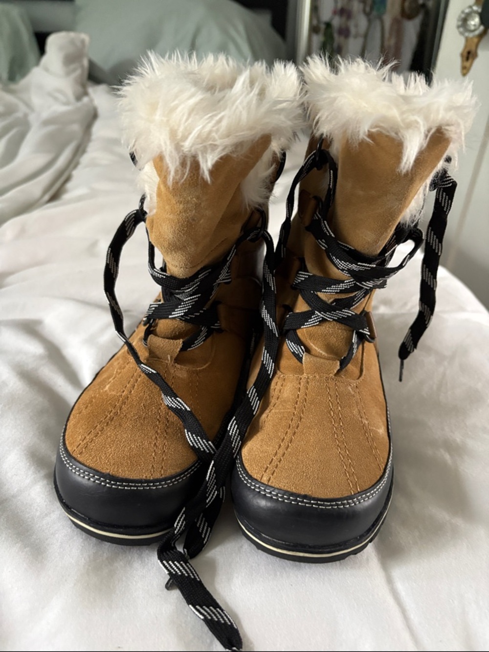 Merona Faux Fur snow/rain boot. Never worn.